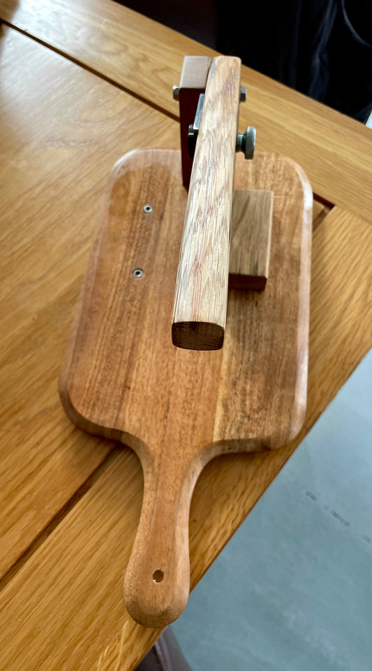 Acacia Biltong Cutting Board with Whiskey oak barrel handle.